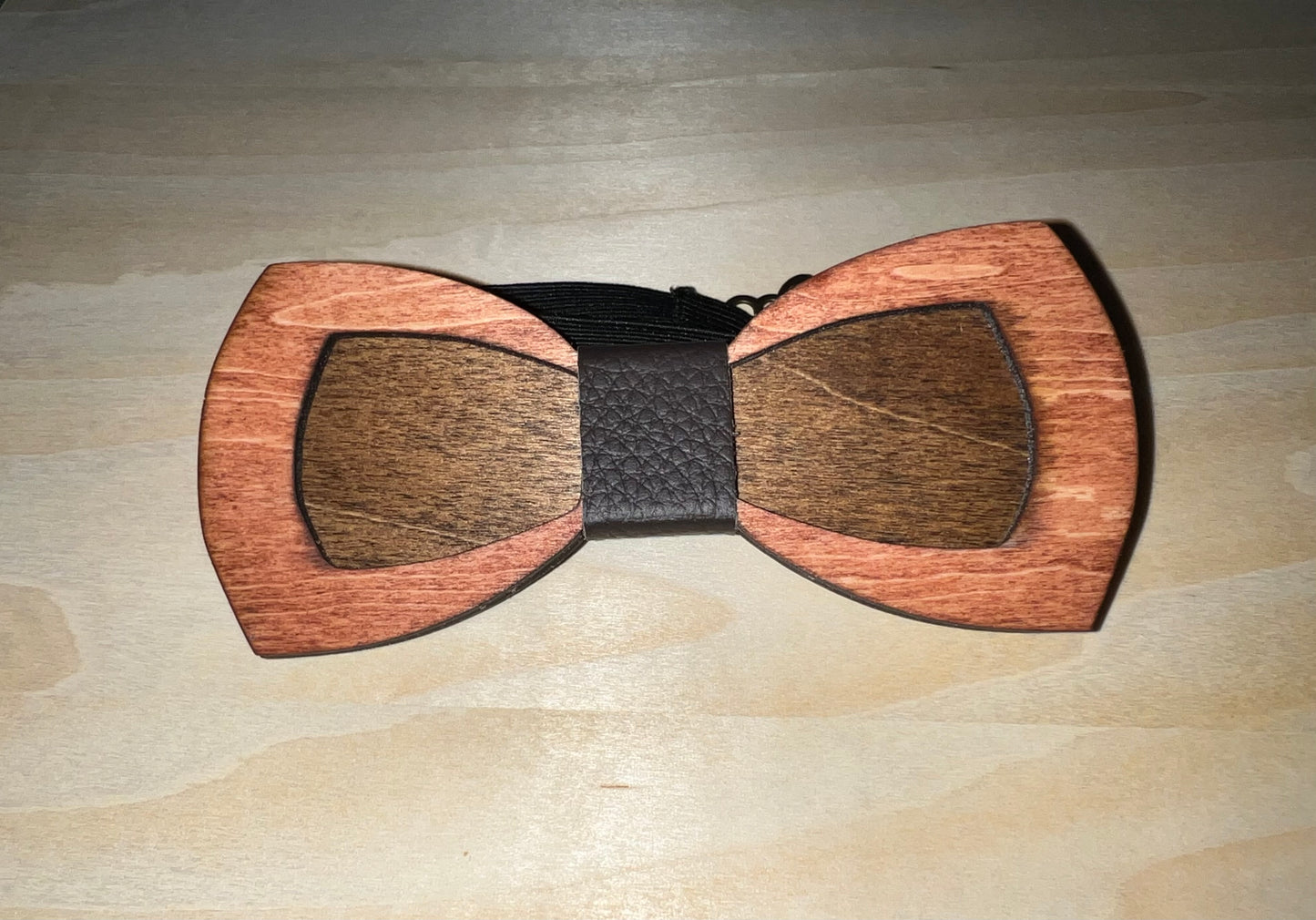 Two shades of brown wooden bow tie