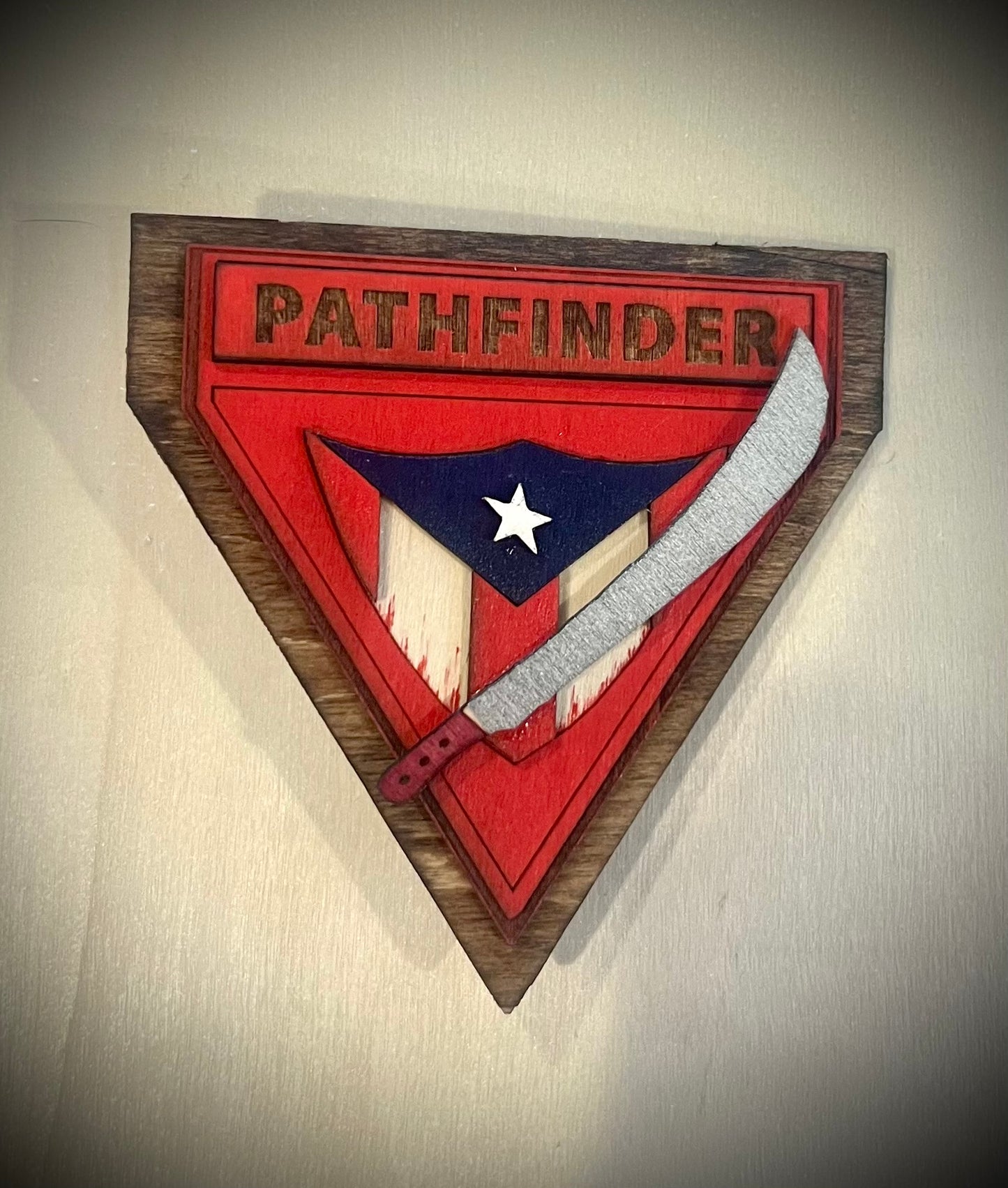 Wooden pin - Pathfinder logo with PR flag and machete